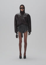 Load and play video in Gallery viewer, Collarless puffer jacket in black leather
