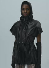 Load and play video in Gallery viewer, Elasticized leather peplum jacket in black

