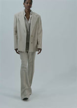 Load and play video in Gallery viewer, Wool crossover blazer in beige
