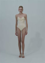 Load and play video in Gallery viewer, Sculptural rose bustier swimsuit in cream

