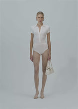 Load and play video in Gallery viewer, Lace-detail polo bodysuit in cream
